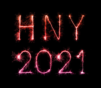 2021 happy new year fireworks written sparklers at night