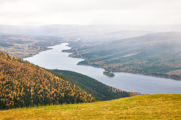 Autumnal view from the high mountains in &Aring;re with view over the &Aring;re lake and autumnal mountain landscape of the Swedish county J&auml;mtland.