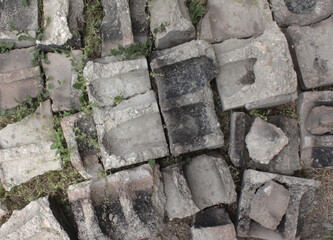 string, background of stones, broken bricks and blocks