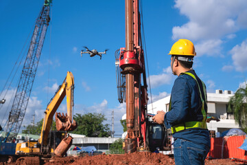Drone inspection new construction site. Operator inspecting new construction site control by civil...