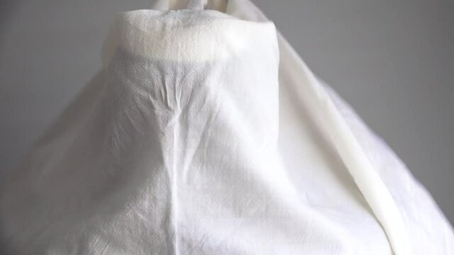 Jewish man wrap himself with talit