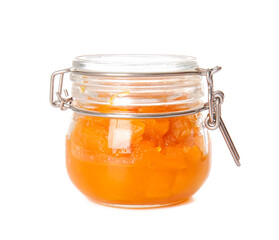 Jar of tasty pumpkin jam on white background