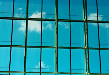 large window frame with blue cloud sky