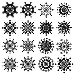 Black snowflakes on an isolated white background. Snow. Winter. Snowflake pattern.