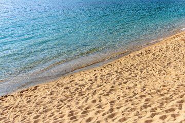 Sand with blue sea at Corsica