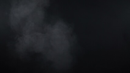 Video of white smoke on black background