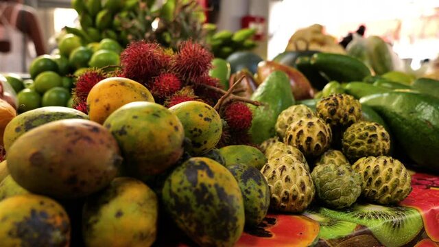 Beautiful close up on exotic fruits in Fort de France market colorful stall Martinique