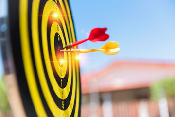 Bullseye is the goal of business success. Dart is an opportunity and a dartboard is a goal and a goal. Therefore, both present a challenge in business marketing as an idea.