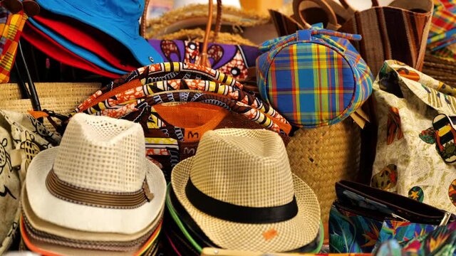 Souvenirs for sale at a local  market hats bags and baskets Fort de France Martinique west indies