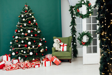 New Year's Home Christmas Tree with gifts decor green background