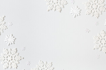 Christmas composition. Frame made of snowflakes on pastel gray background. Christmas, winter, new...