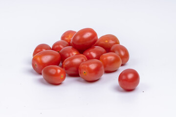 Group of cherry tomatoes isolated on white background