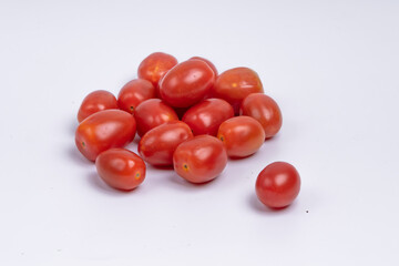 Group of cherry tomatoes isolated on white background