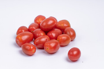 Group of cherry tomatoes isolated on white background