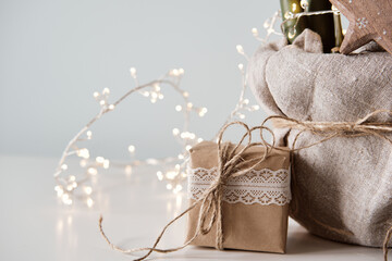 Christmas zero waste. Eco friendly packaging gift in kraft paper and lace