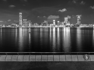 Night scenery of Victoria harbor of Hong Kong city