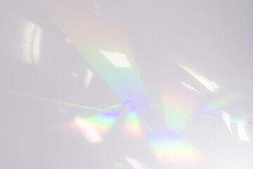 Blurred rainbow light refraction texture overlay effect for photo and mockups. Organic drop...