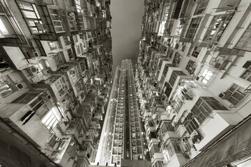 Old and new residential buildings in Hong Kong city at night