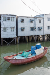 Fototapeta na wymiar Residential stilt house with tin siding in Tai O fishing village, Lantau island, Hong Kong