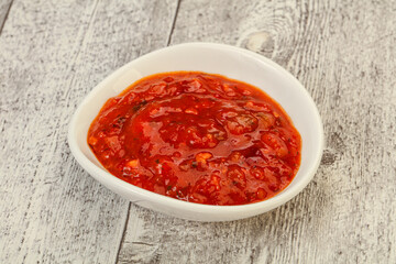 Tomato spicy sauce in the bowl