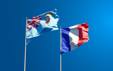 Beautiful national state flags of France and Fiji together at the sky background. 3D artwork concept.