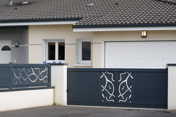 modern gray design gate aluminum portal outdoor door front of suburbs house - obrazy, fototapety, plakaty