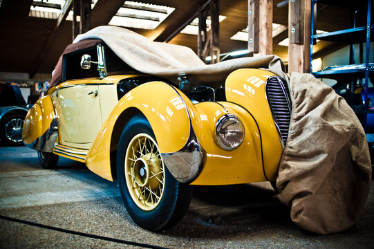 talbot lago special, vintage french cabriolet in a garage