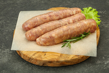 Raw pork meat sausages for grill