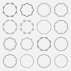 Fototapeta premium Set of vector round frames made of wavy intersecting lines. Vintage black decorative banners.