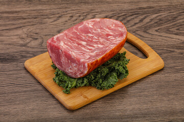Beef ham piece over board