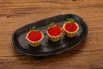 Apetizer - tartlet with red caviar