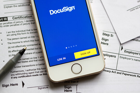 Portland, OR, USA - Mar 29, 2020: DocuSign mobile app login page is seen on a smartphone. As part of the DocuSign Agreement Cloud, DocuSign offers eSignature, a way to sign electronically on devices.