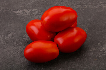 Red bright tasty tomato heap