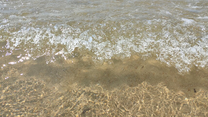 light summer wave on the sea close up