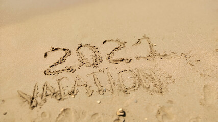 handmade written  VACATION on the sea beach