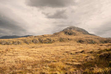 Peak of Diamond hill in Connemara National park, Letterfrack town, county Galway, Ireland. Warm sunny day, cloudy sky. Nobody. Popular tourist destination.