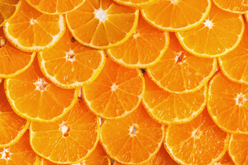 Citrus background. Lemon, orange lime, grapefruit mandarin. Harvest concept. Top view. Tangerine segments, orange background texture