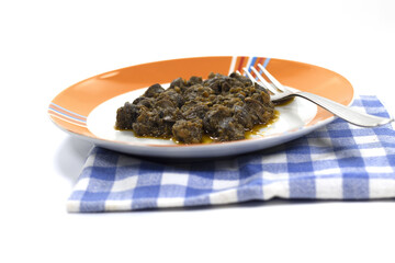 jugged snails prepared and served on a plate