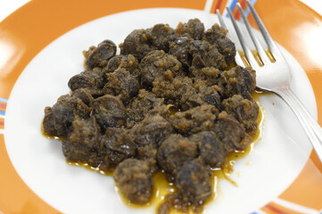 jugged snails prepared and served on a plate