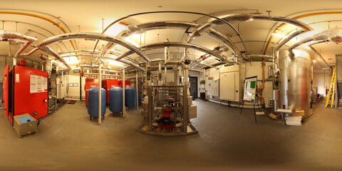 360 Degree full sphere panoramic photo of a modern boiler control room in a basement