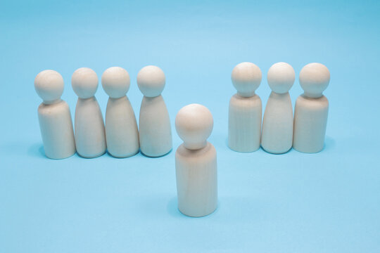 Stand out from the crowd wood figure and different concept