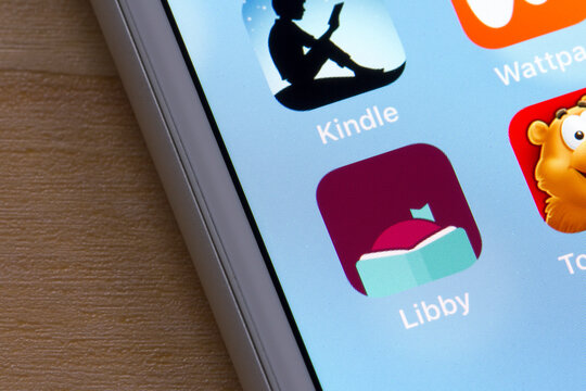 Portland, OR, USA - May 20, 2020: Libby mobile app icon is seen on a smartphone. Libby, built by OverDrive, is a free app where users can borrow ebooks and digital audiobooks from public libraries.