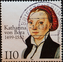 GERMANY - CIRCA 1999 : a postage stamp from Germany, showing a portrait of the wife of Martin...