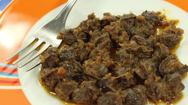 jugged snails prepared and served on a plate