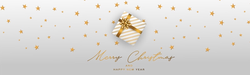 Fototapeta na wymiar Merry Christmas and a Happy New Year banner or header. Simple luxurious design with golden stars, gift box. Winter holidays concept. Vector illustration.