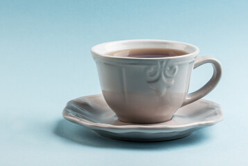 A cup of tea  on a neutral background