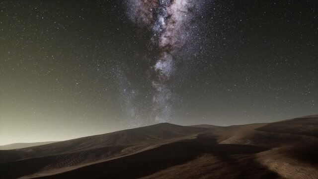 Amazing milky way over the dunes Erg Chebbi in the Sahara desert