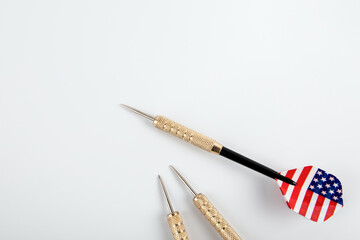 Three dart with the flag of the United States of America on a white