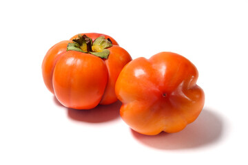 Persimmons isolated on white background.