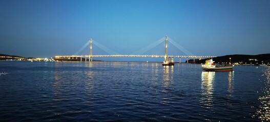 sunset over the sea bridge